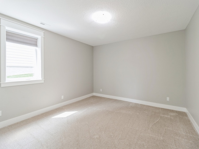 empty room with carpet floors