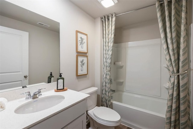 bathroom featuring toilet, shower / bath combination with curtain, vanity, and visible vents