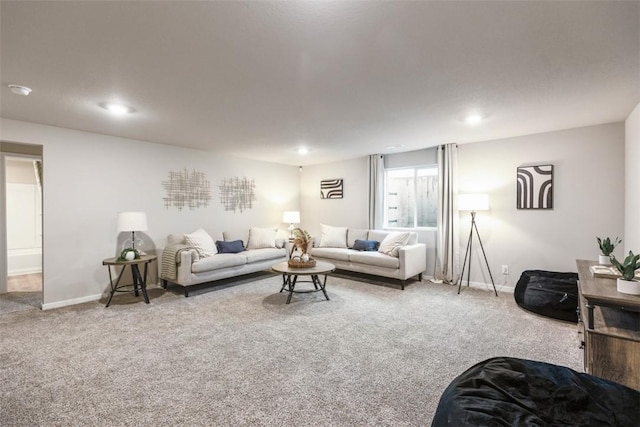 carpeted living room featuring recessed lighting and baseboards