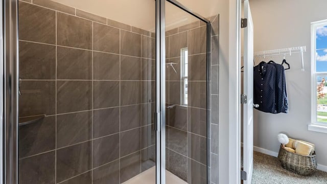 full bath featuring a tile shower