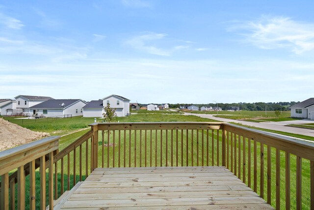 deck featuring a lawn