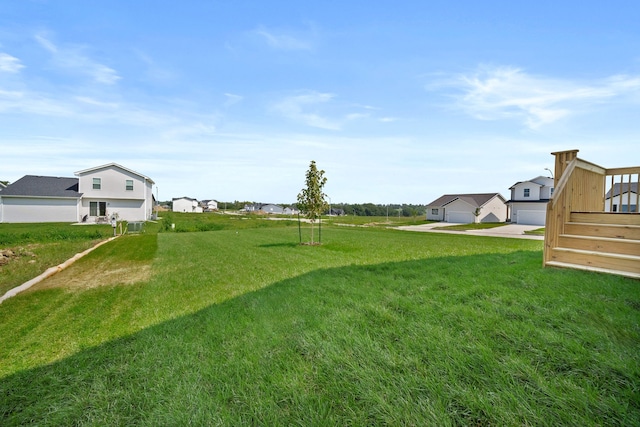 view of yard featuring a garage