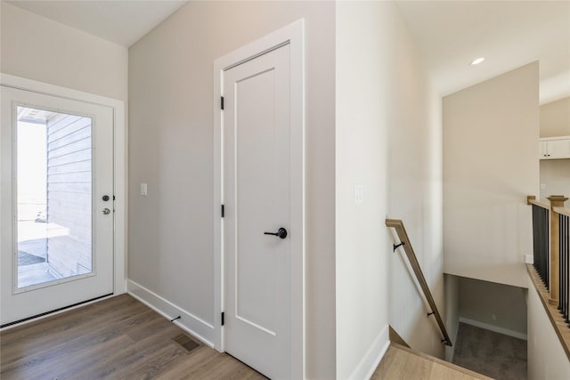 interior space with dark hardwood / wood-style floors