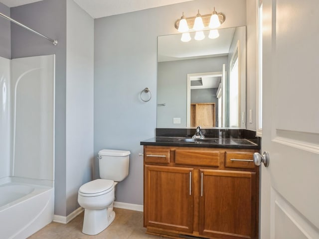 full bathroom with tile patterned floors, toilet, vanity, baseboards, and shower / bathtub combination