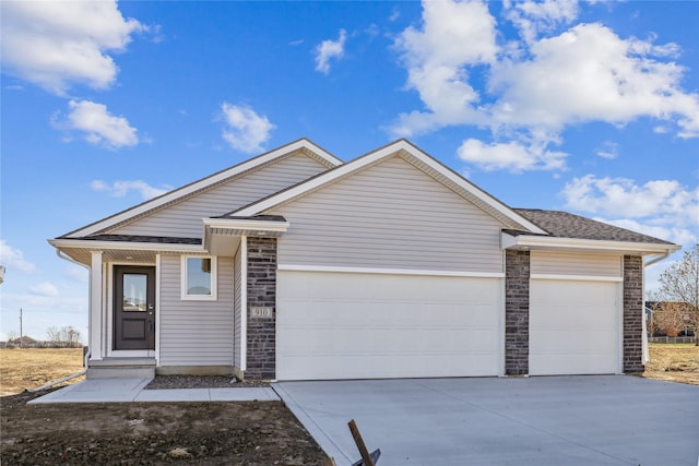 ranch-style home with a garage