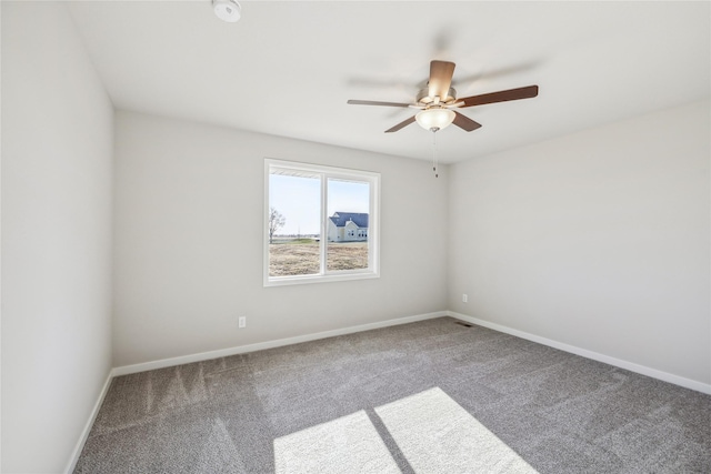 910 Willow Valley Dr, Norwalk, IA 50211 - carpeted empty room with ceiling fan and baseboards