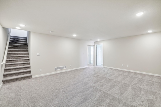 910 Willow Valley Dr, Norwalk, IA 50211 - carpeted empty room with recessed lighting, stairs, and baseboards