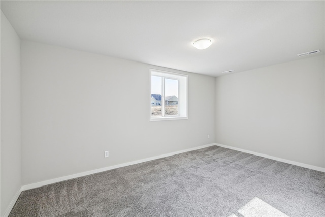 empty room with carpet flooring