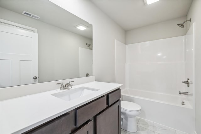 full bathroom with toilet, vanity, and tub / shower combination