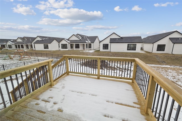 view of snow covered deck