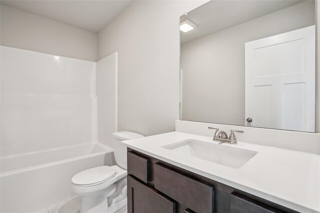 18025 Alpine Dr, Clive, IA 50325 - bathroom with vanity, toilet, marble look tile flooring, and shower / bathtub combination
