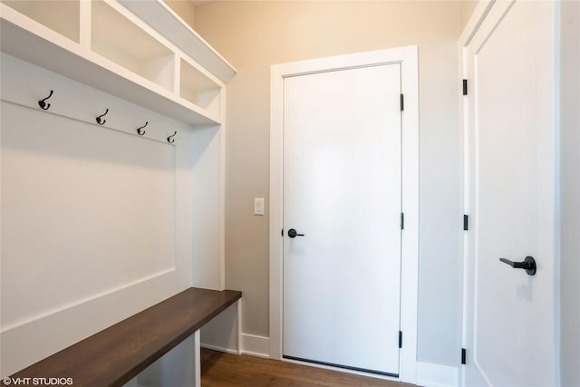 2750 SE Florence Dr, Waukee, IA 50263 - mudroom featuring dark wood-style floors and baseboards