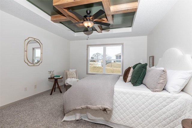 bedroom with carpet, coffered ceiling, a ceiling fan, and baseboards