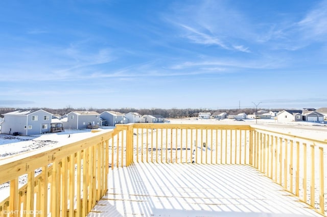 view of snow covered deck