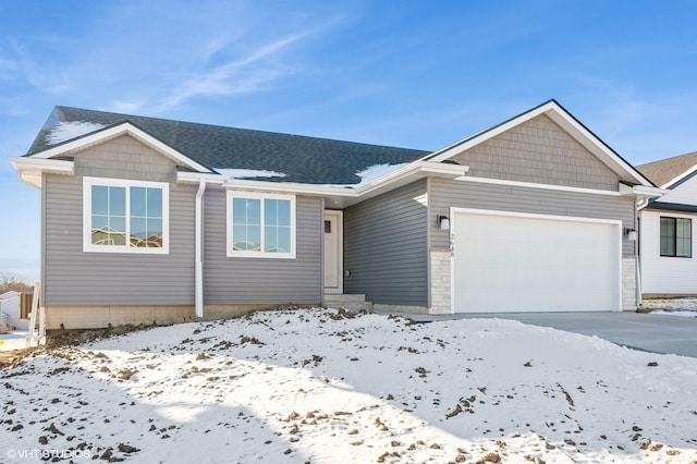 single story home with a garage