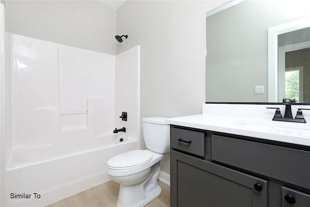 bathroom featuring shower / bath combination, toilet, wood finished floors, and vanity