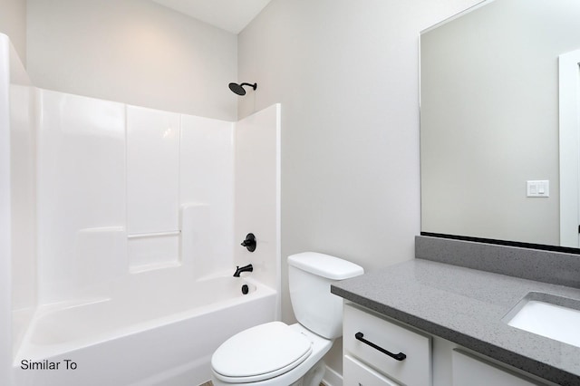 full bath featuring toilet, vanity, and  shower combination