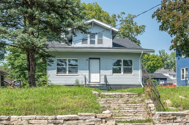 1125 Clinton Ave, Des Moines, IA 50313 - bungalow-style home featuring entry steps and a shingled roof
