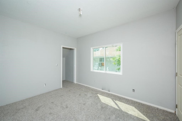 1125 Clinton Ave, Des Moines, IA 50313 - unfurnished bedroom with carpet