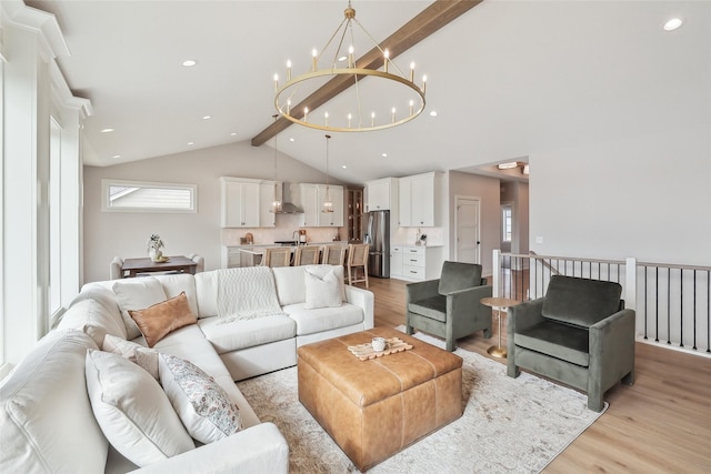 living room with high vaulted ceiling, light wood-style flooring, recessed lighting, beam ceiling, and an inviting chandelier