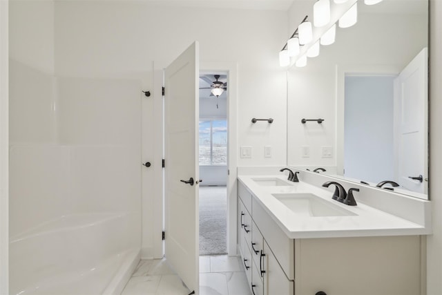 bathroom featuring ceiling fan and vanity