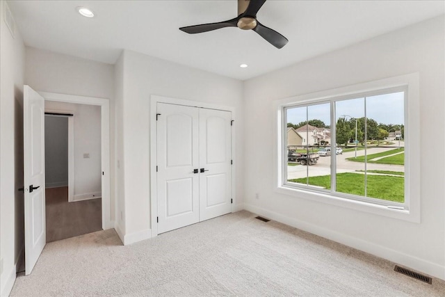 unfurnished bedroom featuring recessed lighting, a closet, visible vents, and baseboards