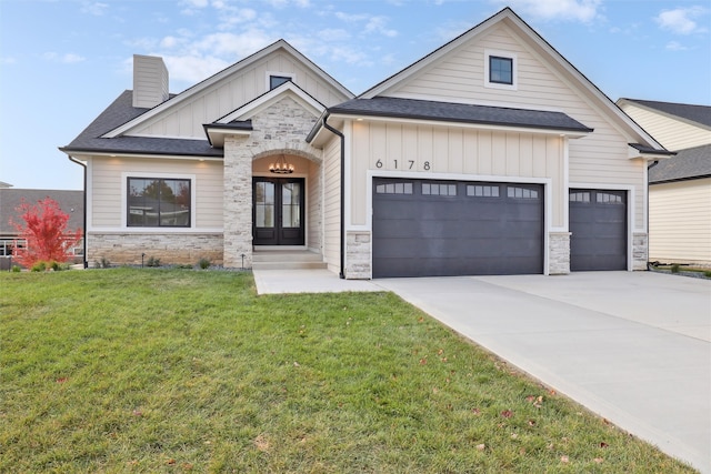 view of front of home featuring stone siding, concrete driveway, board and batten siding, and an attached garage