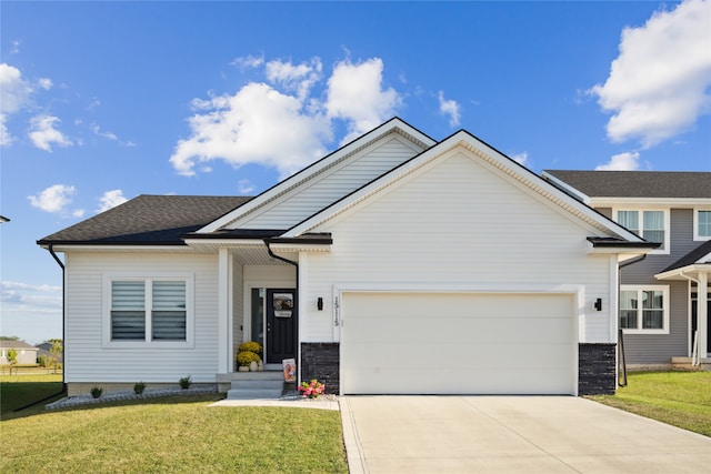 craftsman-style home with a front lawn and a garage