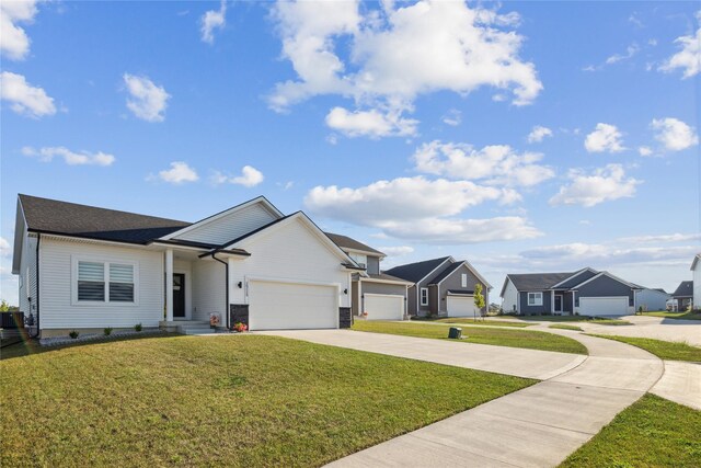 ranch-style home with a front yard and a garage