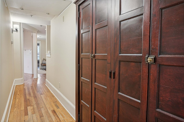 hallway featuring light hardwood / wood-style floors