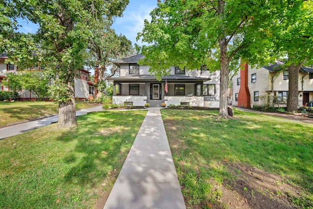 view of front of property featuring a front yard