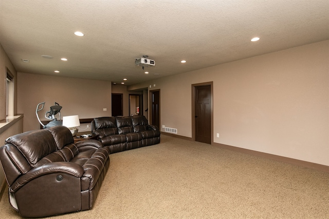 living room featuring a textured ceiling and light colored carpet