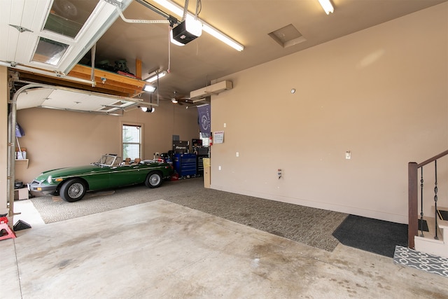 garage featuring a garage door opener