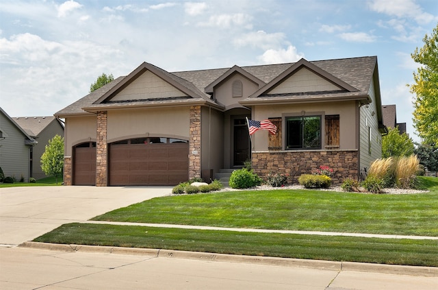 view of front facade with a garage and a front yard