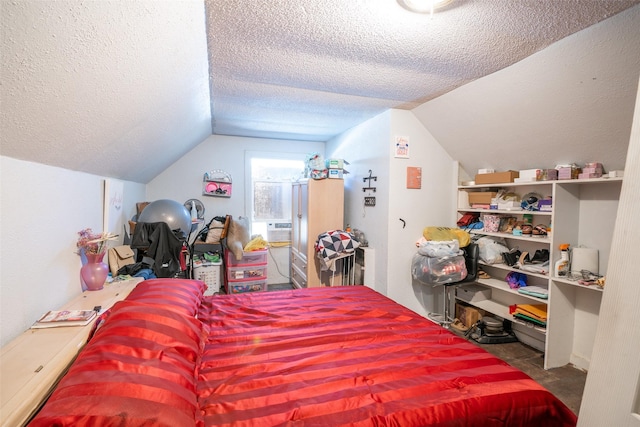 bedroom featuring lofted ceiling, cooling unit, and a textured ceiling