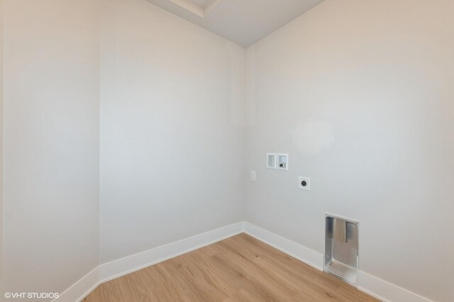 2231 Chan Dr, Adel, IA 50003 - laundry room featuring washer hookup, hookup for an electric dryer, and light wood finished floors