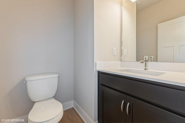 2231 Chan Dr, Adel, IA 50003 - bathroom with vanity and wood finished floors