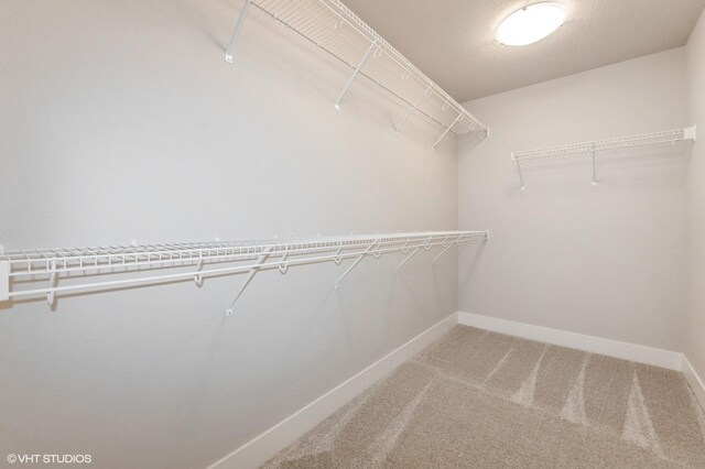 2231 Chan Dr, Adel, IA 50003 - spacious closet featuring carpet