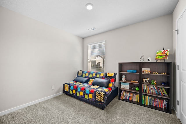 bedroom featuring carpet flooring, visible vents, and baseboards