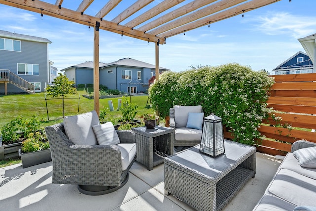 view of patio with fence, a pergola, and an outdoor hangout area