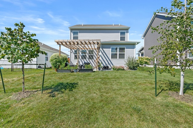 back of house featuring a lawn, a pergola, and fence