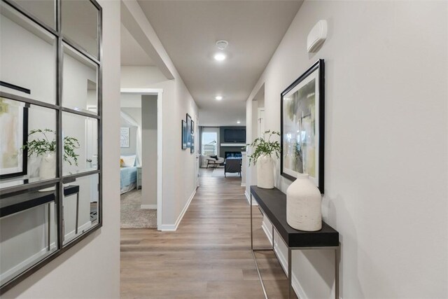 hallway featuring light hardwood / wood-style flooring