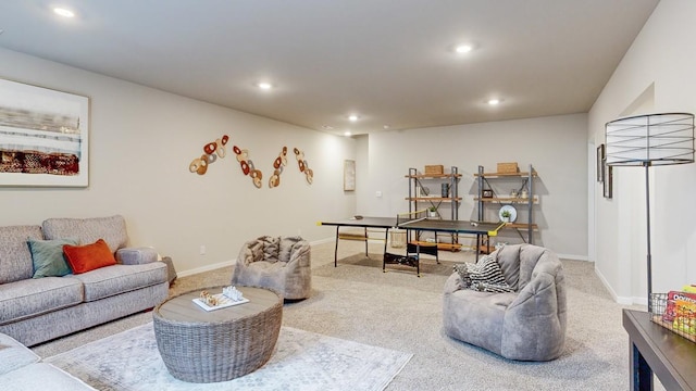 living area with baseboards, carpet floors, and recessed lighting