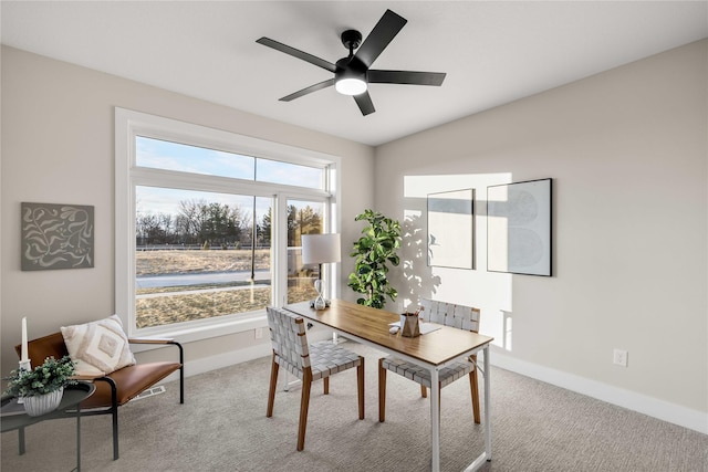 1129 NW 28th St, Grimes, IA 50111 - carpeted home office with baseboards and ceiling fan