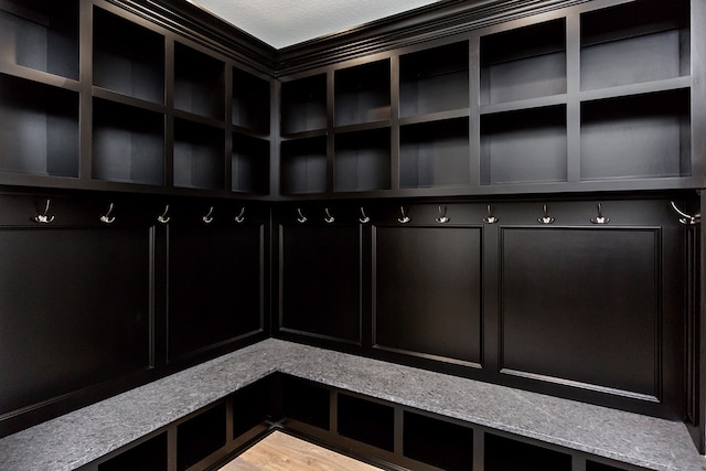 mudroom with light hardwood / wood-style flooring