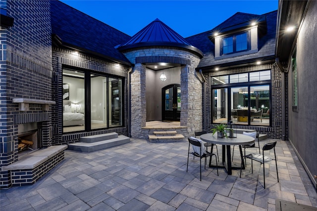 view of patio at twilight