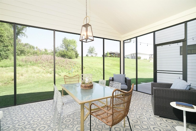 sunroom with lofted ceiling