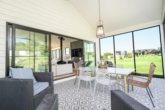 sunroom / solarium with lofted ceiling