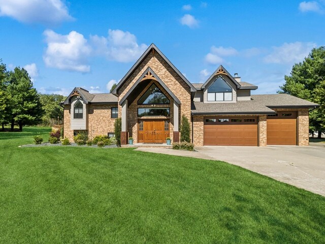 craftsman inspired home with a garage and a front lawn