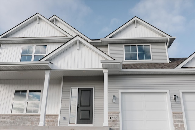 view of front of property with a garage